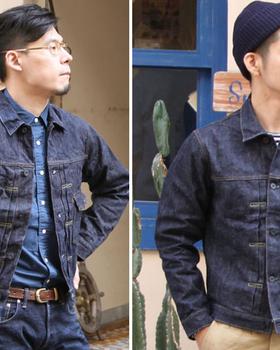 Two men wearing indigo BURGUS PLUS denim jackets outside a shop