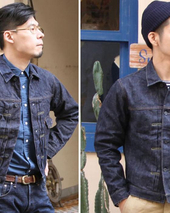 Two men wearing indigo BURGUS PLUS denim jackets outside a shop