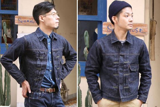 Two men wearing indigo BURGUS PLUS denim jackets outside a shop