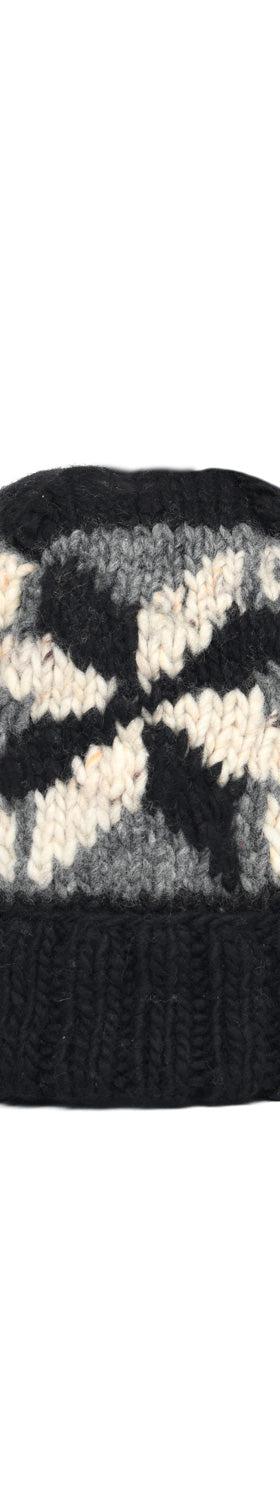 A black, grey and cream hand-knit Chamula beanie with a geometric star motif