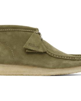 An olive suede Clarks Originals Wallabee boot with a crepe sole