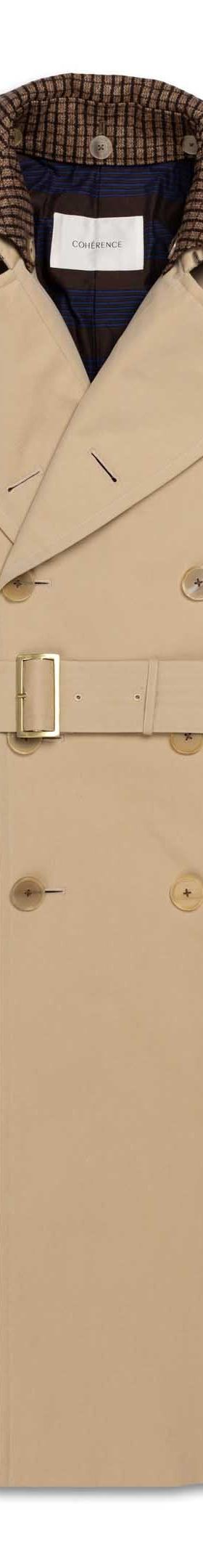 A beige Cohérence trench coat with a brown houndstooth collar and leather-buckled belt