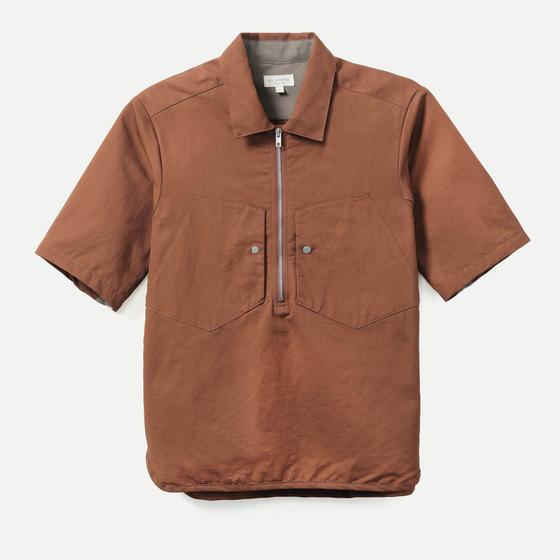 A brown Corpsware half-zip short sleeve utility shirt with patch pockets