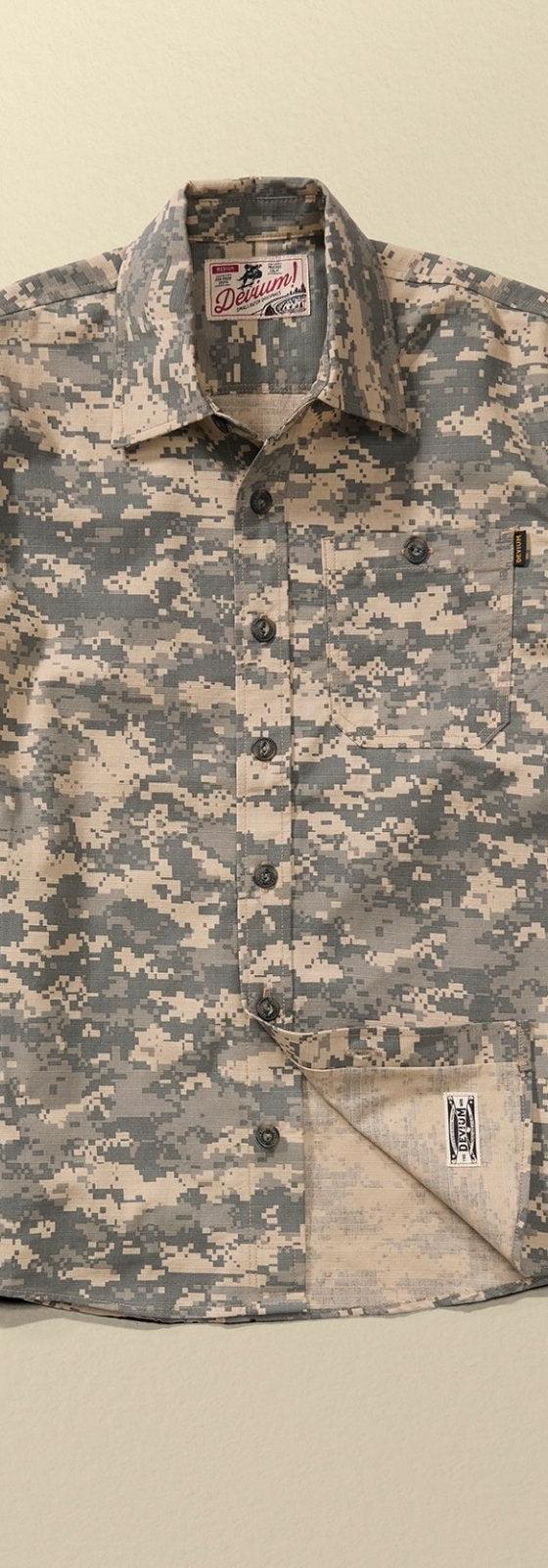 A Devium USA digital camo cotton work shirt on a plain tan background