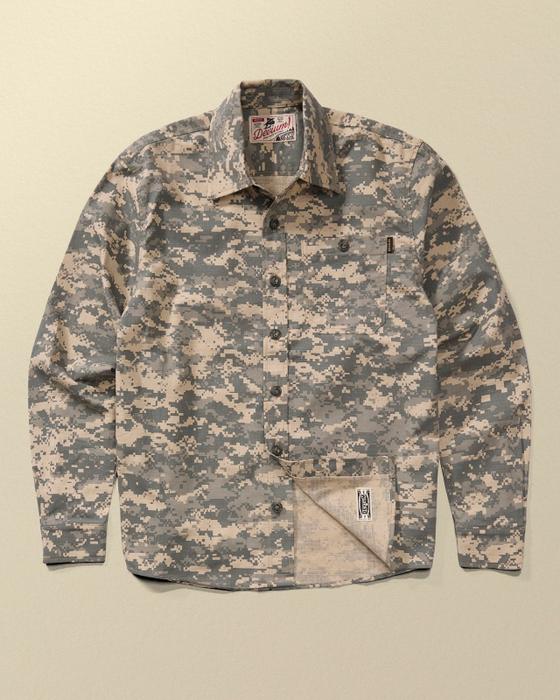 A Devium USA digital camo cotton work shirt on a plain tan background