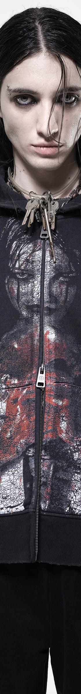 A model wearing an oversized black zip-up hoodie with a distressed horror print by Drop Dead Clothing