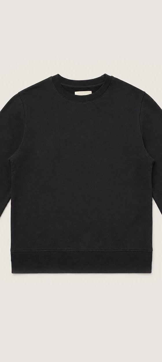A black organic cotton crewneck sweatshirt on a plain cream background