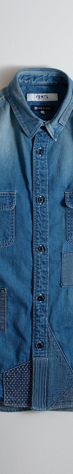 An FDMTL indigo denim shirt with sashiko-stitched boro patchwork
