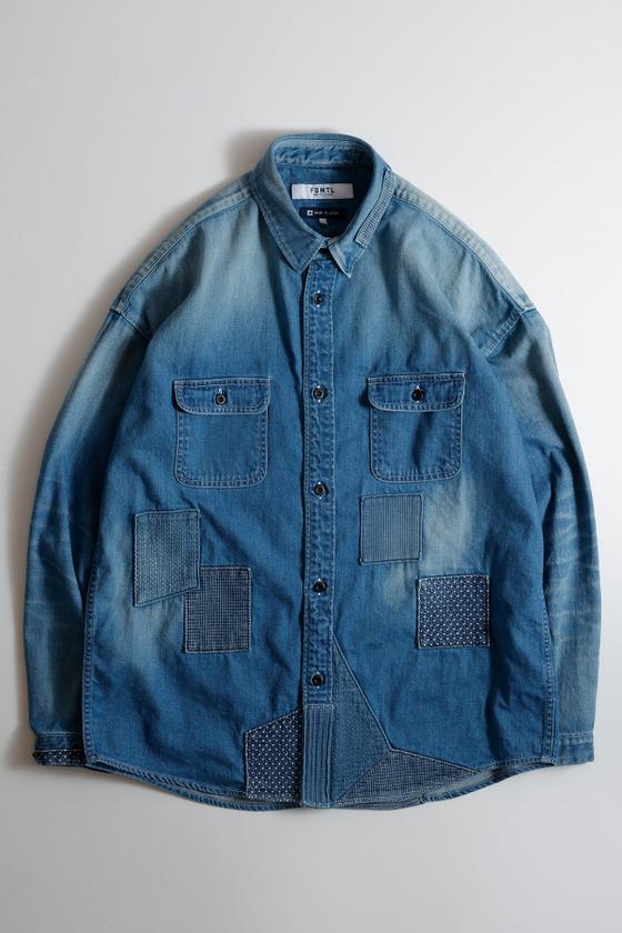 An FDMTL indigo denim shirt with sashiko-stitched boro patchwork