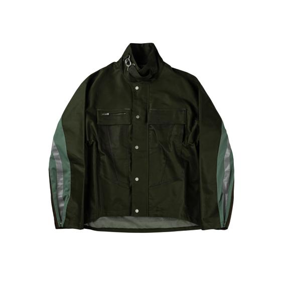 A dark olive FFFPOSTALSERVICE paneled technical jacket with contrast green side inserts and snap front