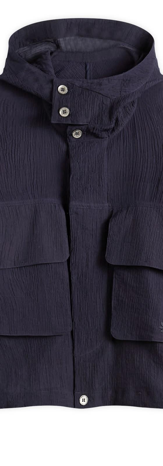 A navy Gander hooded utility jacket with large flap pockets