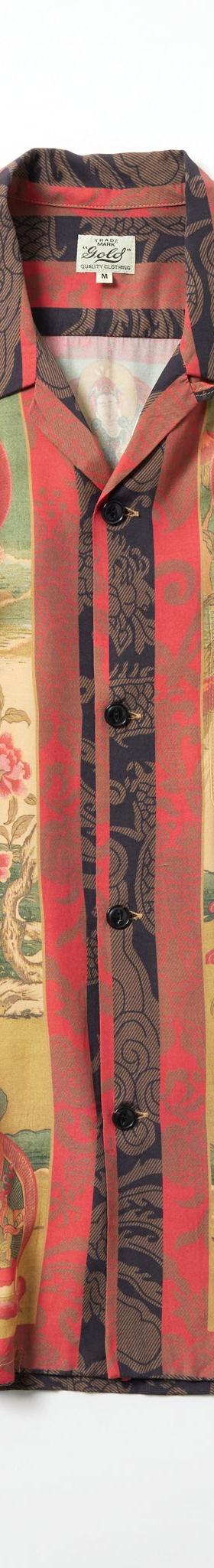 A gold (Toyo Enterprise) open-collar rayon aloha shirt in a red, green and gold vintage-inspired print