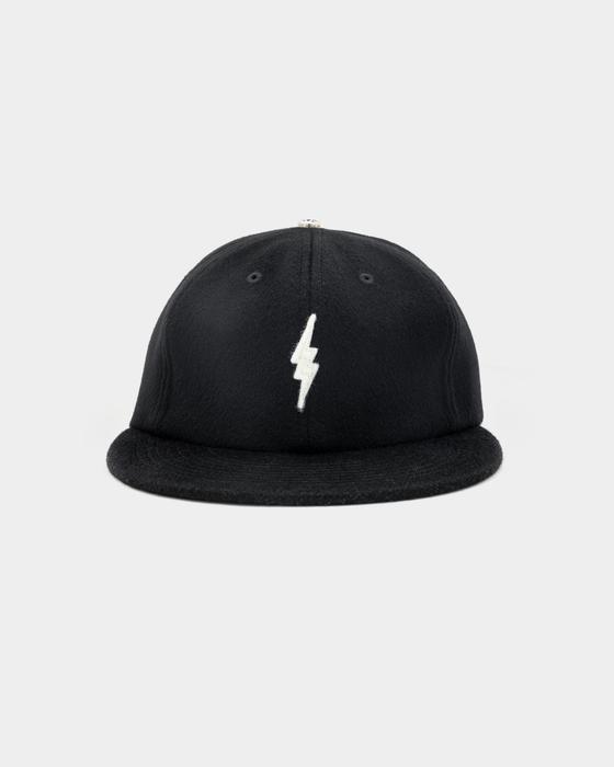 A black wool GOOD ART HLYWD cap with a white lightning bolt embroidery