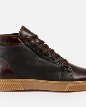A brown leather Goral high-top sneaker boot with a gum sole on a plain background