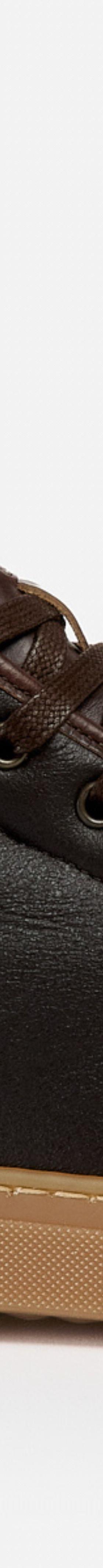 A brown leather Goral high-top sneaker boot with a gum sole on a plain background