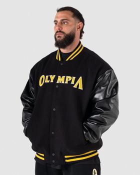 A man wearing a black Gymreapers Olympia varsity jacket with leather sleeves
