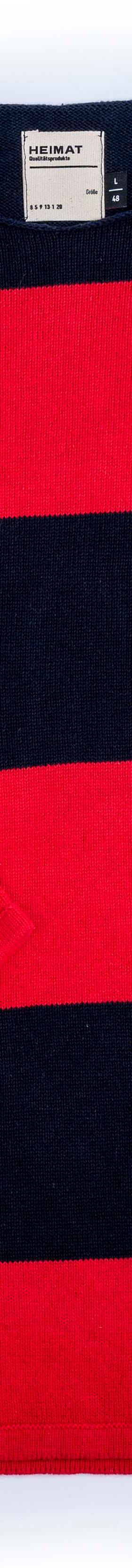 A navy and red block-striped Heimat Textil crewneck knit sweater laid flat on a white background