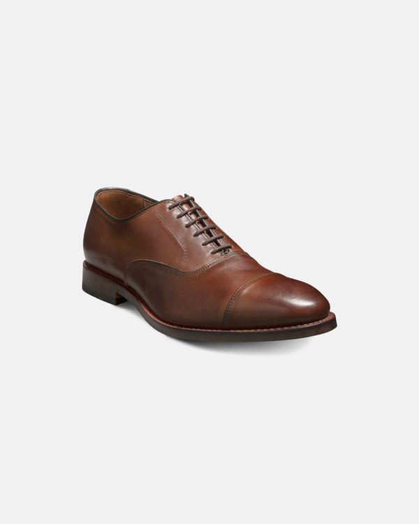 A tan brown leather cap-toe oxford shoe by J. Press