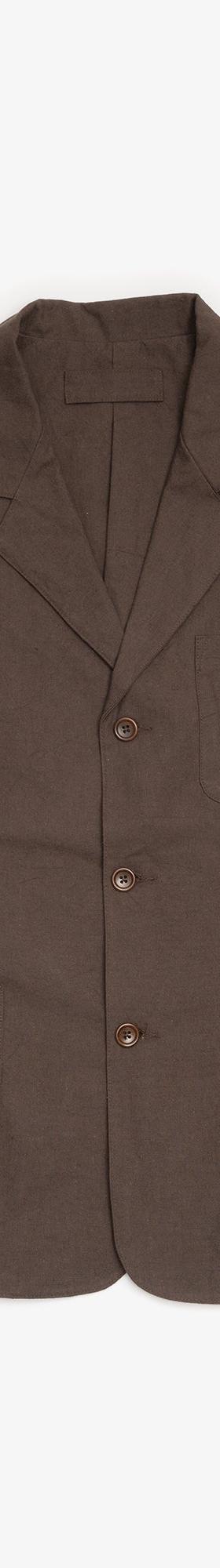A brown James Coward workwear blazer with patch pockets on a plain background