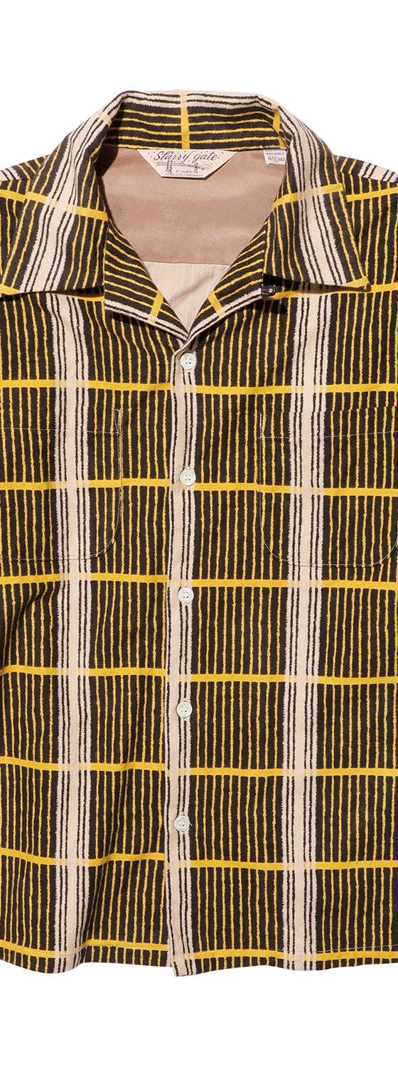A striped and checked mid-century style open-collar shirt by JELADO on a plain white background
