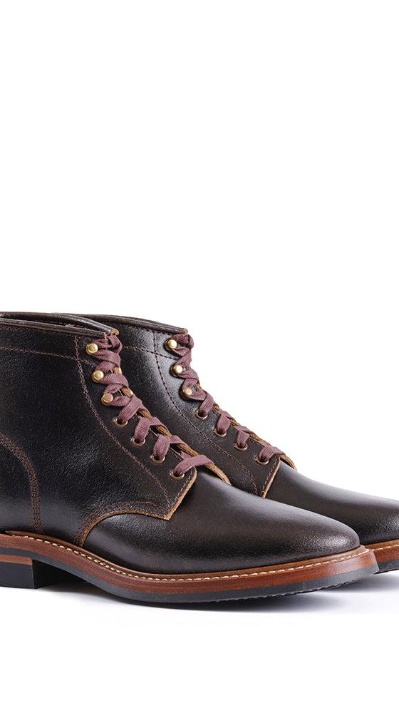 A pair of dark brown leather John Lofgren service boots with Goodyear-welted leather soles