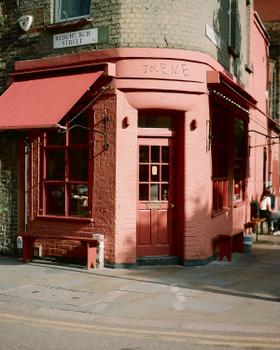 The pink corner storefront of Jolene bakery on Redchurch Street in London