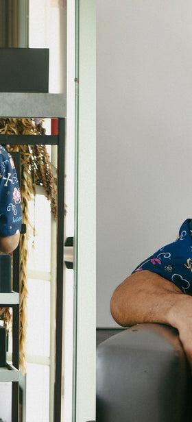 Kahala x IN4MATION model wearing a navy printed aloha shirt