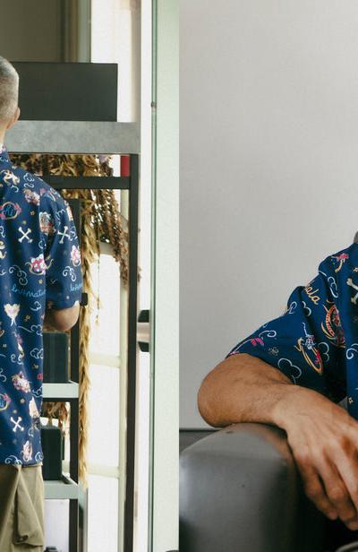 Kahala x IN4MATION model wearing a navy printed aloha shirt