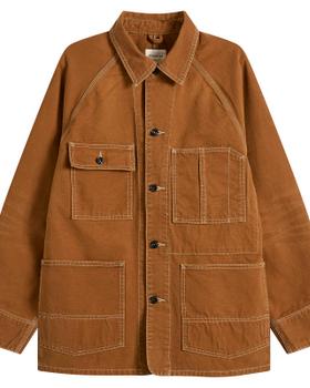 A brown Khakis chore jacket with contrast stitching on a plain background