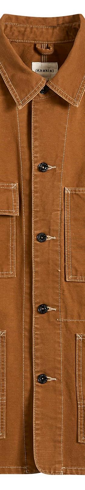 A brown Khakis chore jacket with contrast stitching on a plain background
