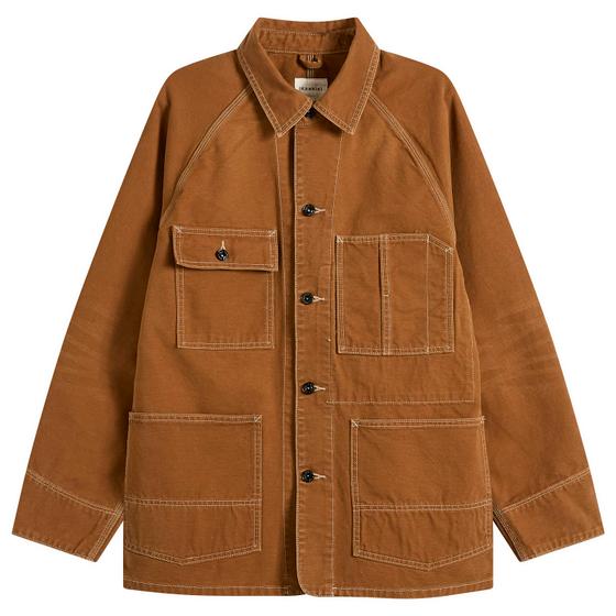 A brown Khakis chore jacket with contrast stitching on a plain background