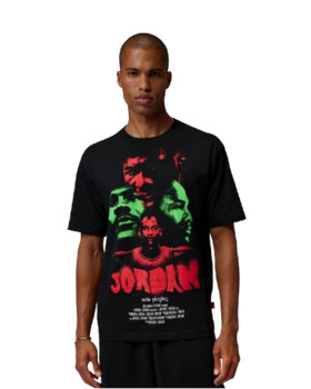 A man wearing a black Jordan graphic T-shirt with black shorts