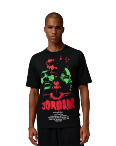 A man wearing a black Jordan graphic T-shirt with black shorts