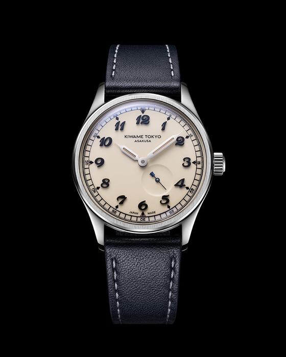 Kiwame Tokyo KUBO Usuki watch with an ivory lacquer dial and navy leather strap, on black
