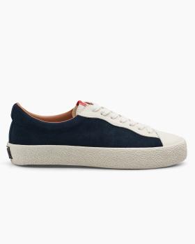 A navy suede Last Resort AB VM001 vulcanised skate shoe with cream sole