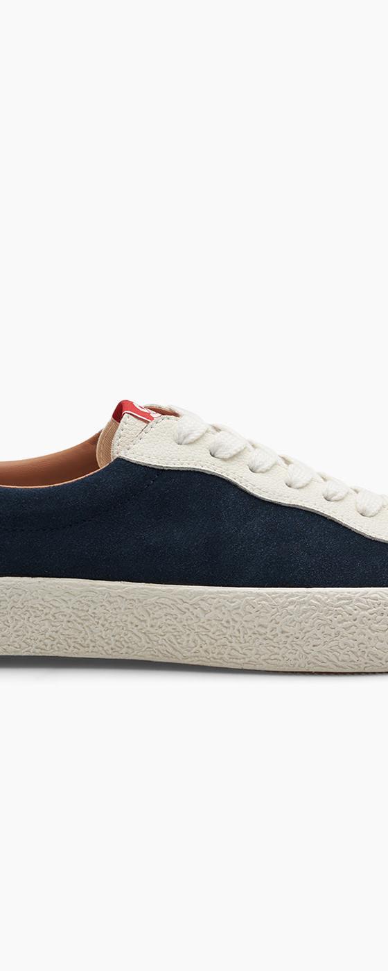 A navy suede Last Resort AB VM001 vulcanised skate shoe with cream sole