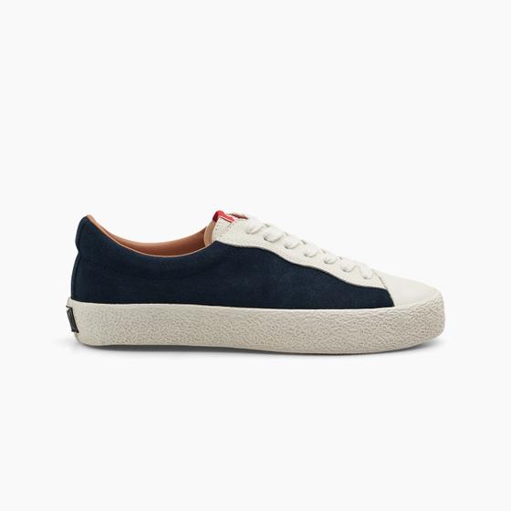 A navy suede Last Resort AB VM001 vulcanised skate shoe with cream sole
