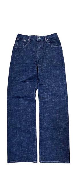 A pair of dark indigo raw selvedge Left Field NYC jeans on a plain white background