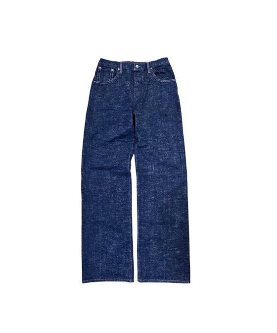 A pair of dark indigo raw selvedge Left Field NYC jeans on a plain white background
