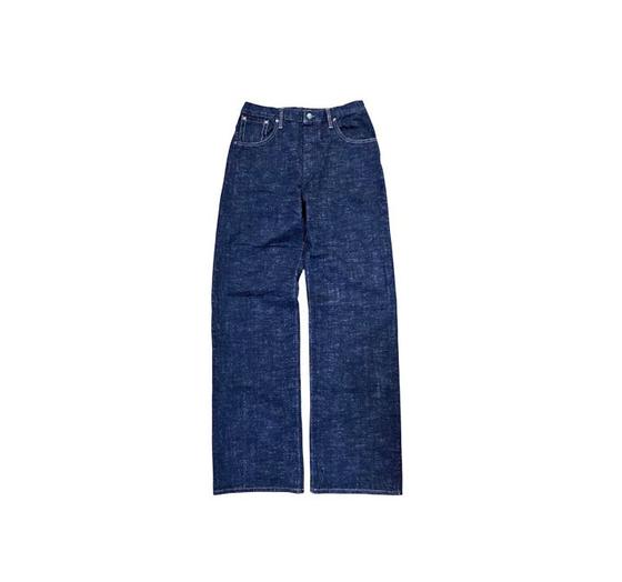 A pair of dark indigo raw selvedge Left Field NYC jeans on a plain white background