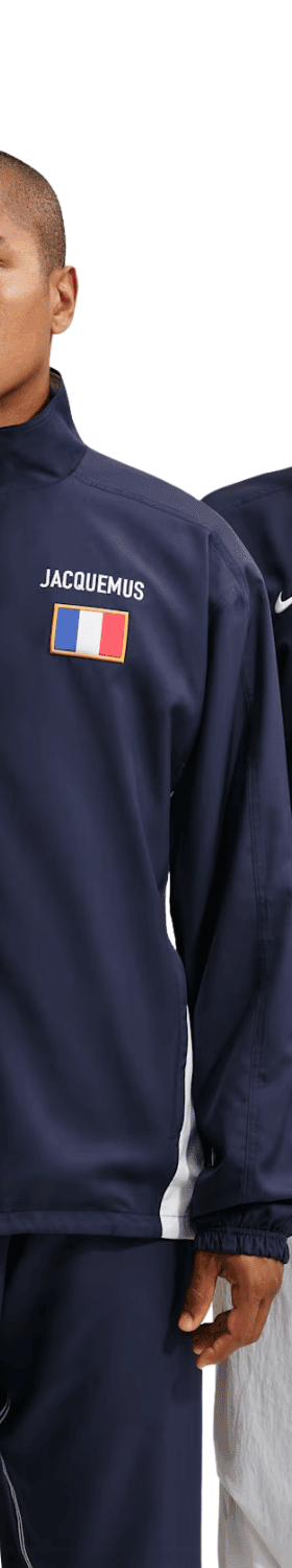 Two models wearing navy Nike x Jacquemus track jackets
