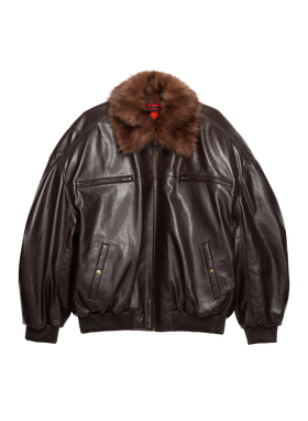 A brown LU'U DAN leather bomber jacket with a fur collar