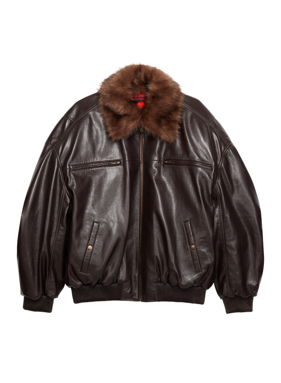 A brown LU'U DAN leather bomber jacket with a fur collar