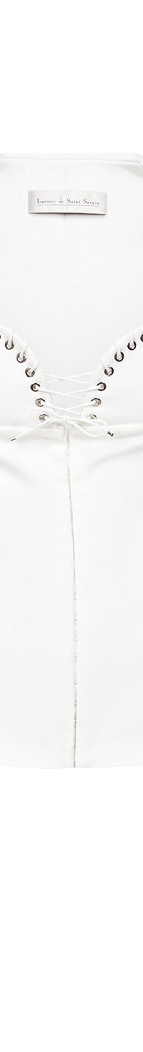 A white Ludovic de Saint Sernin corseted jacket with eyelet lace-up neckline