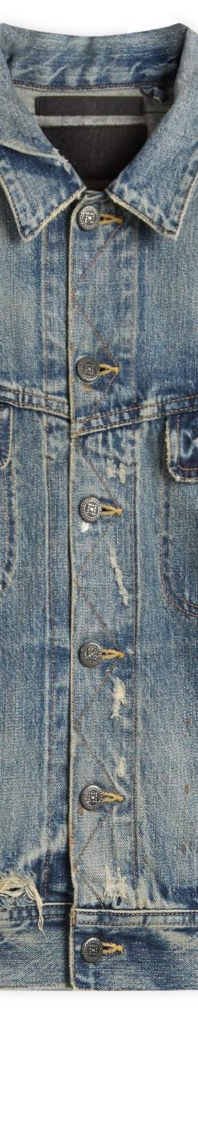 A faded blue Mastercraft Union selvedge denim trucker jacket on a plain white background