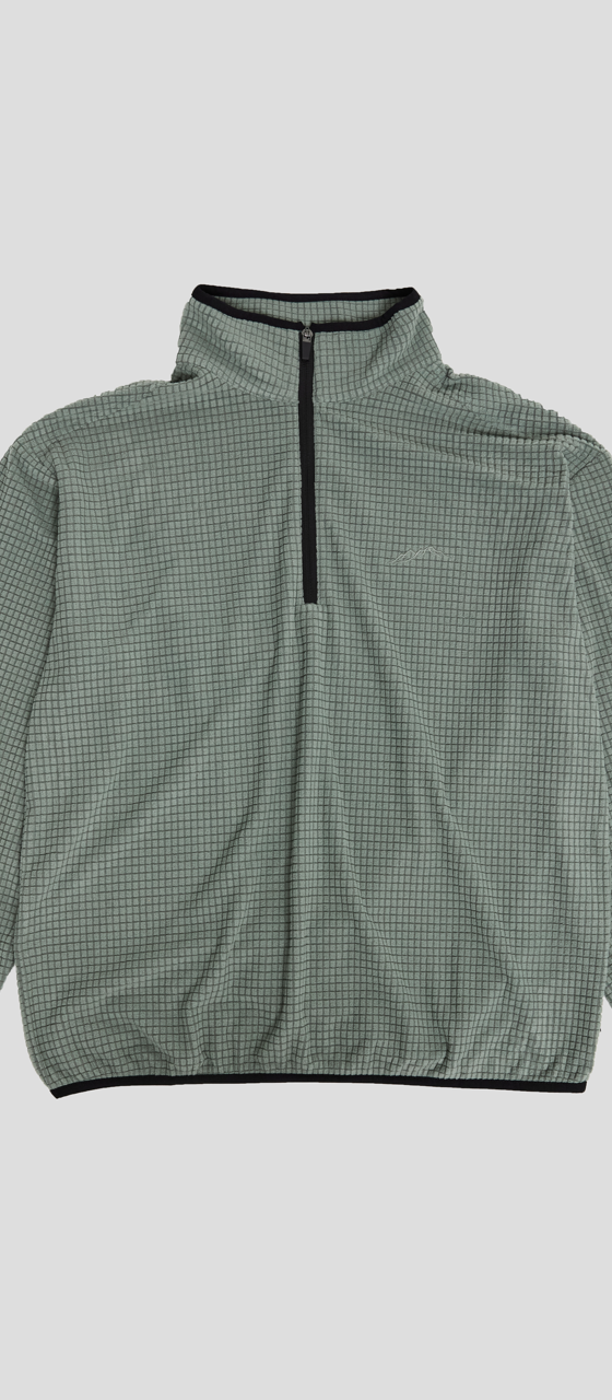 A sage green grid-fleece half-zip pullover with black trim