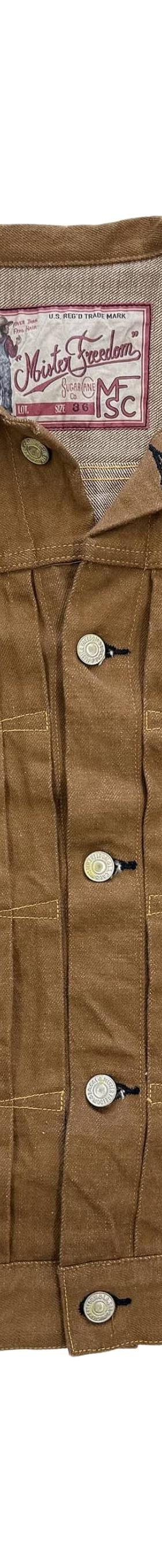A brown canvas Mister Freedom ranch jacket photographed on a white background
