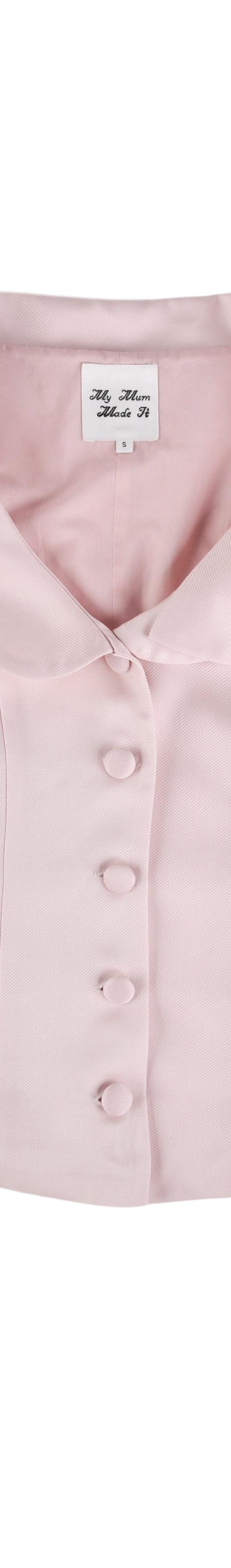 A pale pink My Mum Made It satin blouse with a rounded collar and flared sleeves on a plain white background