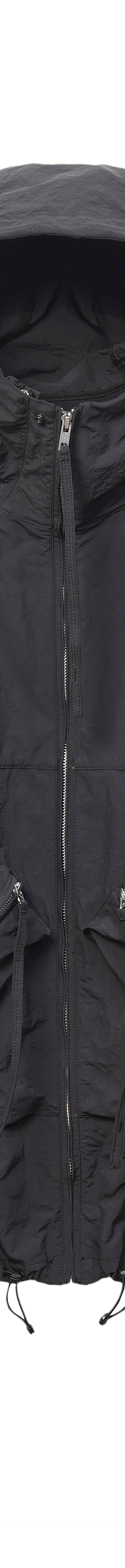 A black technical hooded utility parka with multi-pocket panelling by Nilmance