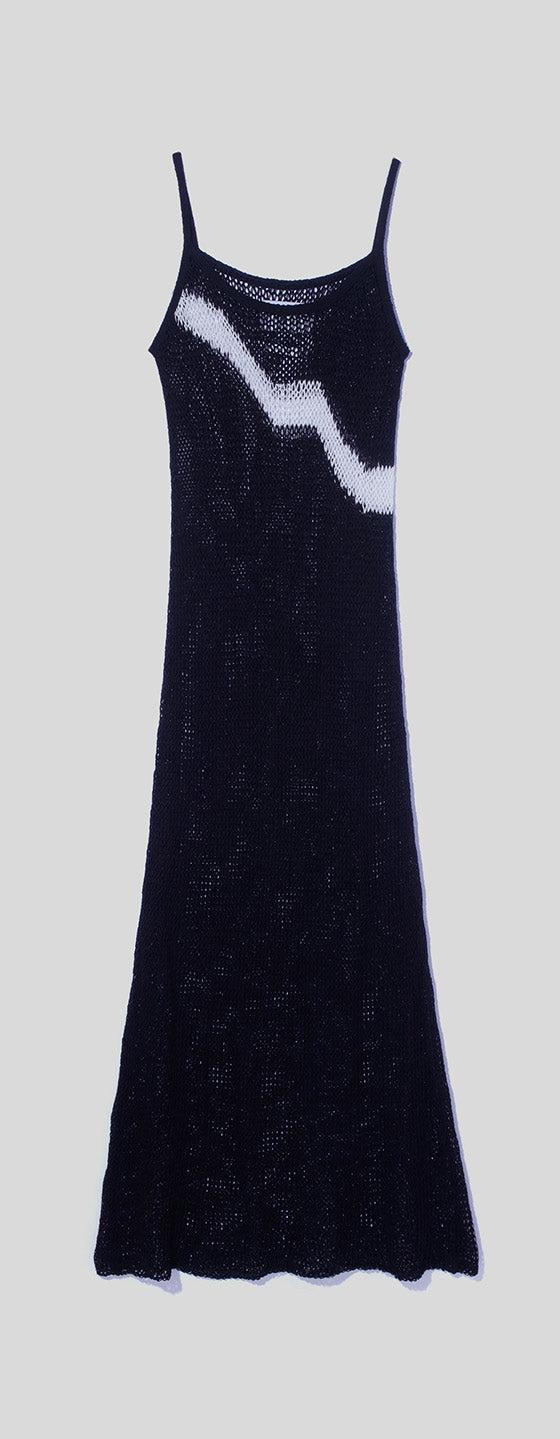 A navy open-knit sleeveless maxi dress with a hand-drawn white wave motif